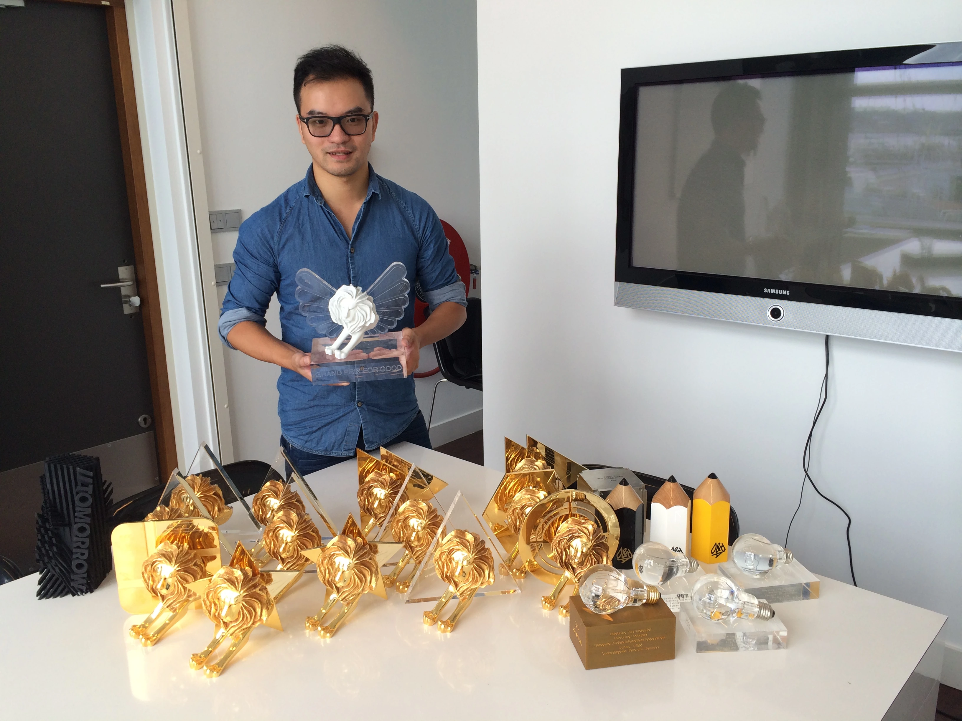 Mao Lin Liao with the Cannes Lions awards